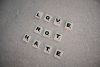 Picture of scrable tiles saying 'Love Not Hate'